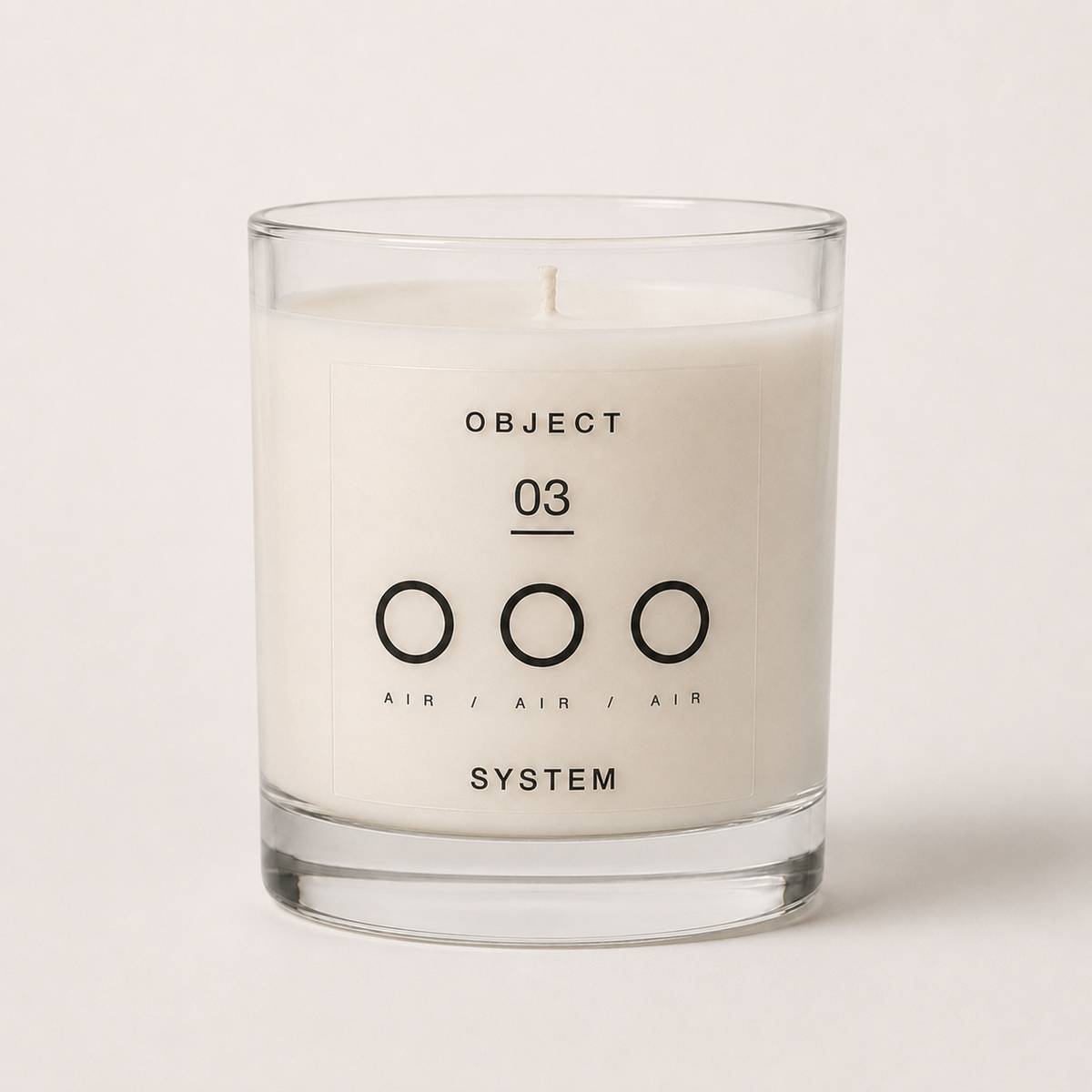 OBJECT 03 candle in its clear glass vessel