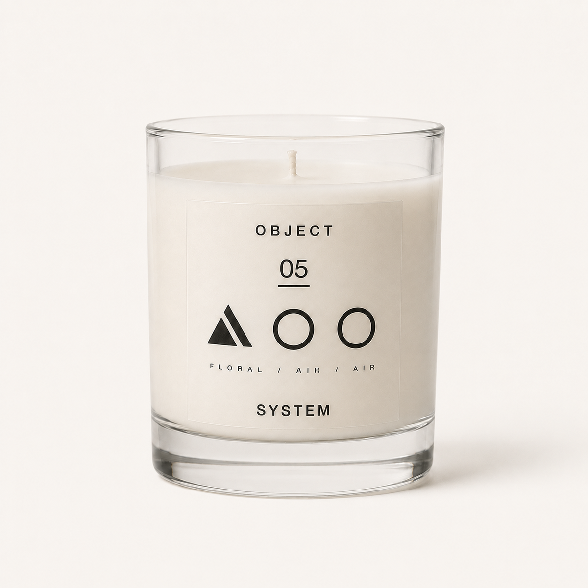 OBJECT 05 candle in its clear glass vessel