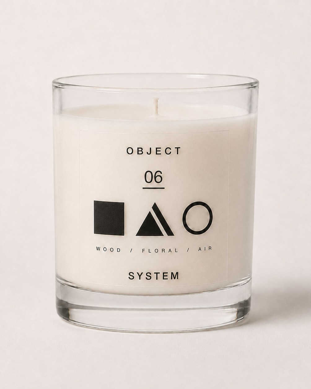 OBJECT 06 candle in its clear glass vessel